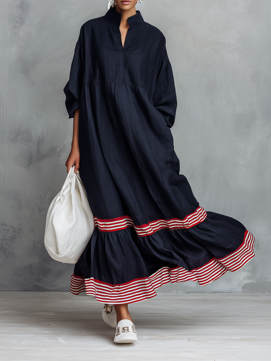 Vestido maxi de lino con manga larga y panel a rayas en el bajo
