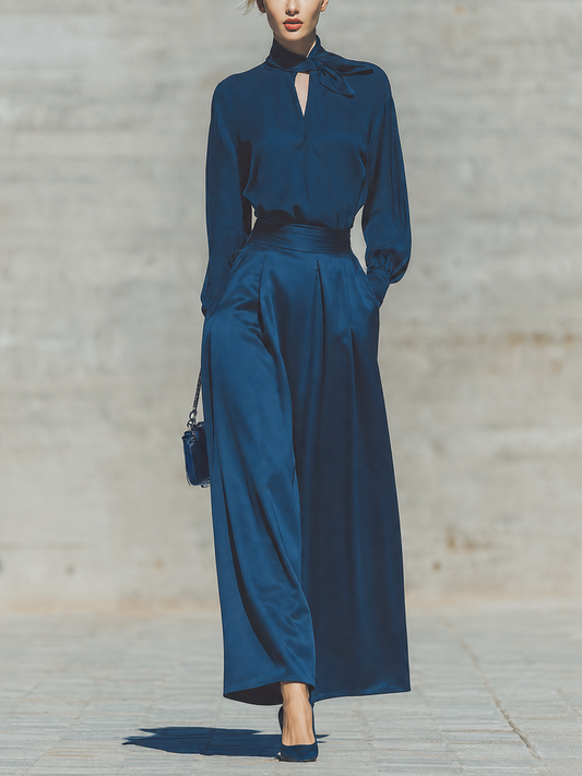 Conjunto azul: top de satén con lazo y falda