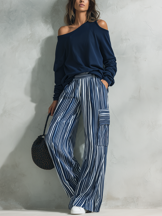 Conjunto azul marino: top sudadera y pantalón de rayas