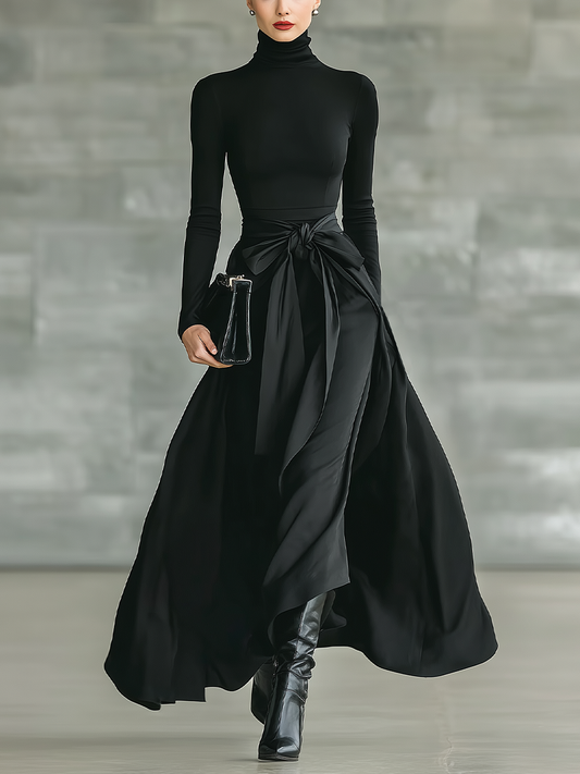 Vestido maxi negro de punto y satén con cuello alto