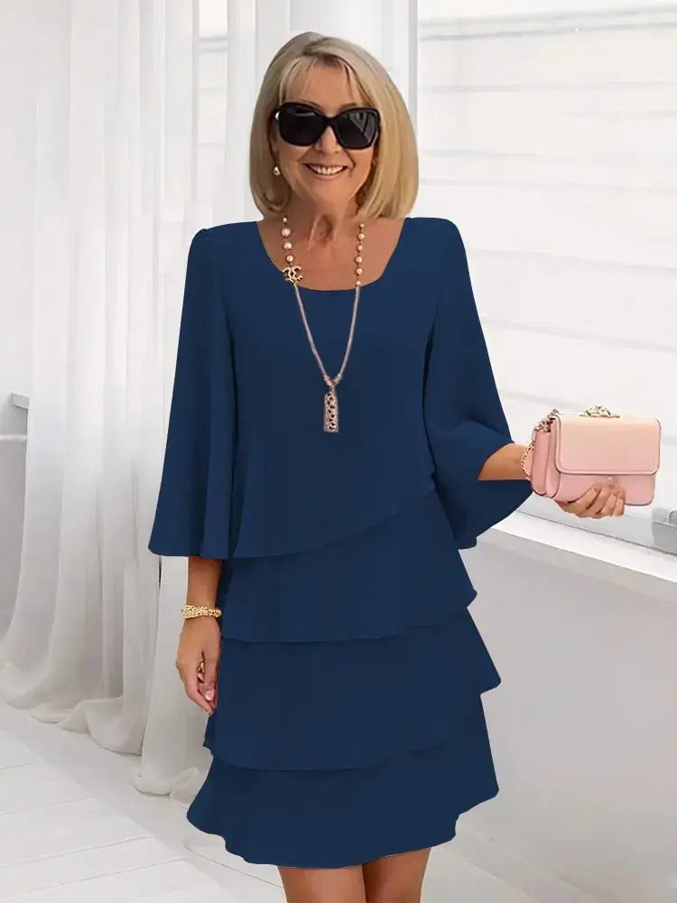 Elsa – Vestido Elegante y Fluido con Volantes Adriana Valera