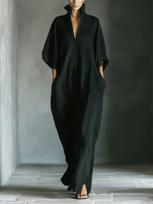 Vestido maxi negro oversize con mangas kimono y bolsillos