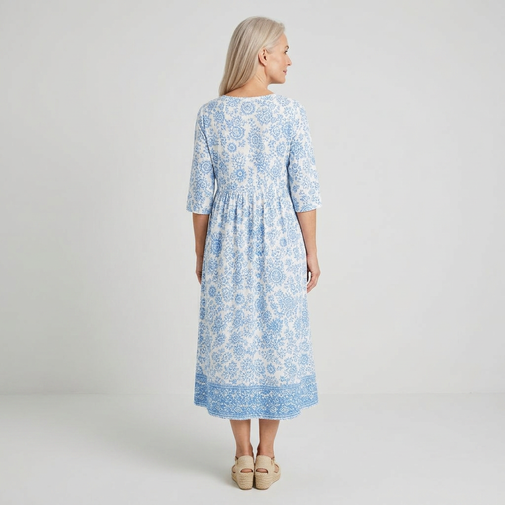 Azulena | Vestido midi blanco con estampado floral azul